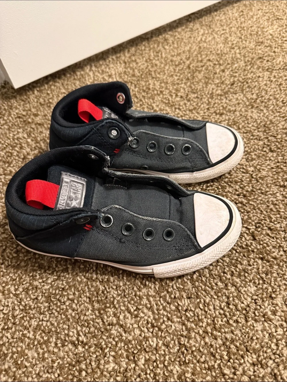 Converse Kids Black Canvas Slip-On Sneakers with Red Heel Loop